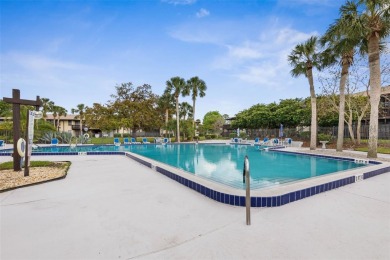 Step into this beautifully detailed 2-bedroom, 2-bath condo on Palm Harbor Golf Club in Florida - for sale on GolfHomes.com, golf home, golf lot