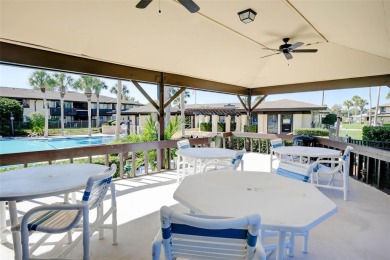 Step into this beautifully detailed 2-bedroom, 2-bath condo on Palm Harbor Golf Club in Florida - for sale on GolfHomes.com, golf home, golf lot