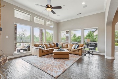 This stunning home, built by Standard Pacific, offers luxury on Trophy Club of Dallas in Texas - for sale on GolfHomes.com, golf home, golf lot