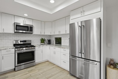 Beautifully remodeled and move-in ready, this stylish 3-bedroom on Desert Springs Golf Club in California - for sale on GolfHomes.com, golf home, golf lot