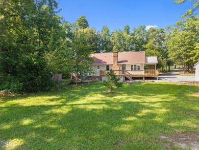 Wonderful single story home with views of beautiful Kerr Lake on Kerr Lake Country Club in North Carolina - for sale on GolfHomes.com, golf home, golf lot