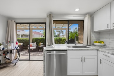 Beautifully remodeled and move-in ready, this stylish 3-bedroom on Desert Springs Golf Club in California - for sale on GolfHomes.com, golf home, golf lot