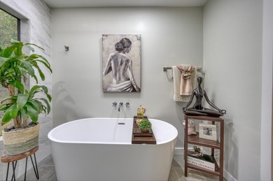 Beautifully remodeled and move-in ready, this stylish 3-bedroom on Desert Springs Golf Club in California - for sale on GolfHomes.com, golf home, golf lot