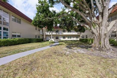 This well kept corner unit offers 1 bed, 1.5 bath- just steps on The American Golf Club in Florida - for sale on GolfHomes.com, golf home, golf lot