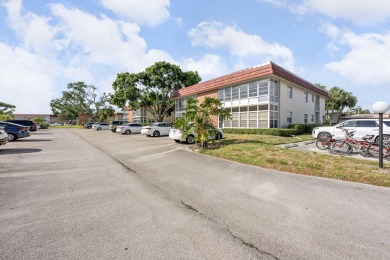 This well kept corner unit offers 1 bed, 1.5 bath- just steps on The American Golf Club in Florida - for sale on GolfHomes.com, golf home, golf lot