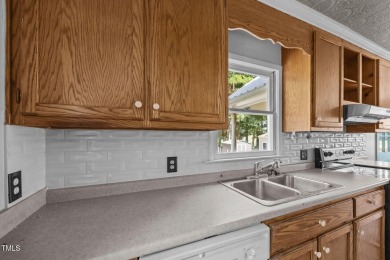 Wonderful single story home with views of beautiful Kerr Lake on Kerr Lake Country Club in North Carolina - for sale on GolfHomes.com, golf home, golf lot