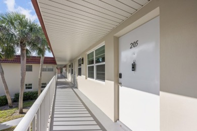 This well kept corner unit offers 1 bed, 1.5 bath- just steps on The American Golf Club in Florida - for sale on GolfHomes.com, golf home, golf lot