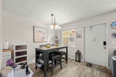This well kept corner unit offers 1 bed, 1.5 bath- just steps on The American Golf Club in Florida - for sale on GolfHomes.com, golf home, golf lot