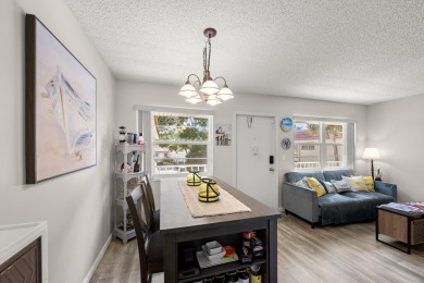 This well kept corner unit offers 1 bed, 1.5 bath- just steps on The American Golf Club in Florida - for sale on GolfHomes.com, golf home, golf lot