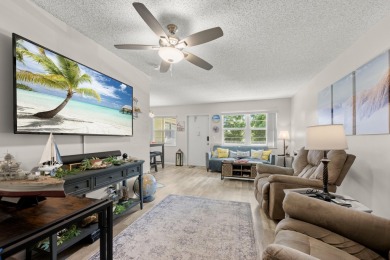 This well kept corner unit offers 1 bed, 1.5 bath- just steps on The American Golf Club in Florida - for sale on GolfHomes.com, golf home, golf lot