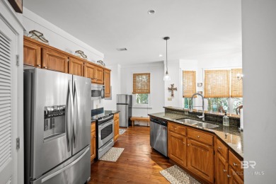 Tucked away in the charming Fish Camp community, this 3-bedroom on Orange Beach Golf Center in Alabama - for sale on GolfHomes.com, golf home, golf lot