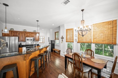Tucked away in the charming Fish Camp community, this 3-bedroom on Orange Beach Golf Center in Alabama - for sale on GolfHomes.com, golf home, golf lot