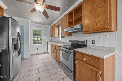 Wonderful single story home with views of beautiful Kerr Lake on Kerr Lake Country Club in North Carolina - for sale on GolfHomes.com, golf home, golf lot