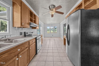 Wonderful single story home with views of beautiful Kerr Lake on Kerr Lake Country Club in North Carolina - for sale on GolfHomes.com, golf home, golf lot