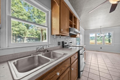 Wonderful single story home with views of beautiful Kerr Lake on Kerr Lake Country Club in North Carolina - for sale on GolfHomes.com, golf home, golf lot