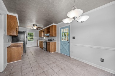 Wonderful single story home with views of beautiful Kerr Lake on Kerr Lake Country Club in North Carolina - for sale on GolfHomes.com, golf home, golf lot