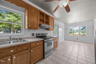 Wonderful single story home with views of beautiful Kerr Lake on Kerr Lake Country Club in North Carolina - for sale on GolfHomes.com, golf home, golf lot