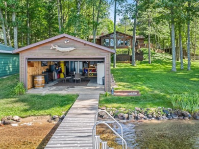 North Shore of Tomahawk Lake Home on Minocqua Country Club in Wisconsin - for sale on GolfHomes.com, golf home, golf lot