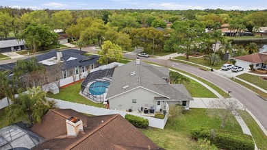 Stunning 3BR/2BA + Bonus Room, Pool Home in Gated East Lake on East Lake Woodlands Country Club in Florida - for sale on GolfHomes.com, golf home, golf lot
