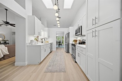 Stunning 3BR/2BA + Bonus Room, Pool Home in Gated East Lake on East Lake Woodlands Country Club in Florida - for sale on GolfHomes.com, golf home, golf lot