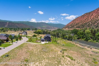 Beautiful, flat lot situated the Roaring Fork River with on Ironbridge Golf Club in Colorado - for sale on GolfHomes.com, golf home, golf lot