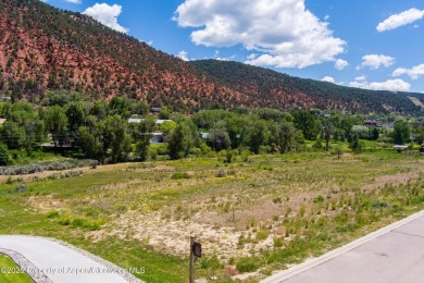 Beautiful, flat lot situated the Roaring Fork River with on Ironbridge Golf Club in Colorado - for sale on GolfHomes.com, golf home, golf lot