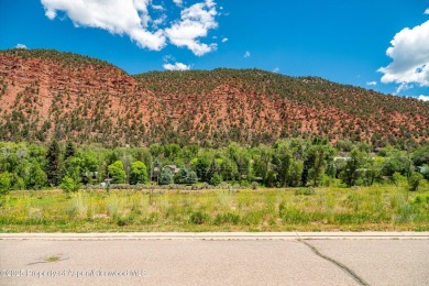 Beautiful, flat lot situated the Roaring Fork River with on Ironbridge Golf Club in Colorado - for sale on GolfHomes.com, golf home, golf lot
