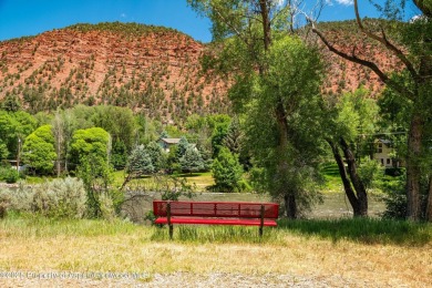 Beautiful, flat lot situated the Roaring Fork River with on Ironbridge Golf Club in Colorado - for sale on GolfHomes.com, golf home, golf lot