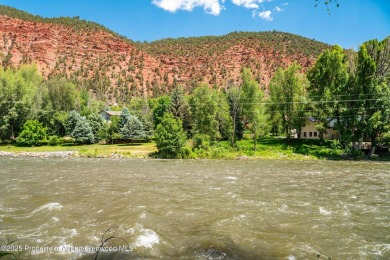 Beautiful, flat lot situated the Roaring Fork River with on Ironbridge Golf Club in Colorado - for sale on GolfHomes.com, golf home, golf lot