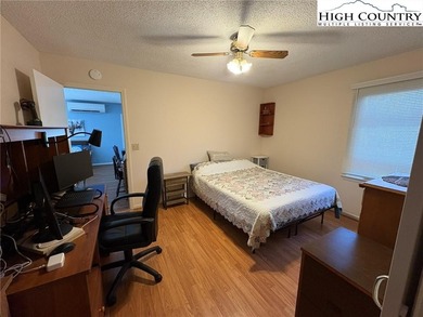 Fabulously located home in the resort community of Linville Land on Land Harbor Golf Course in North Carolina - for sale on GolfHomes.com, golf home, golf lot