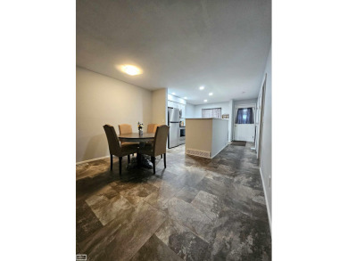 This charming 2-bedroom, 2.5-bath townhouse-style condominium on Marysville Golf Course in Michigan - for sale on GolfHomes.com, golf home, golf lot