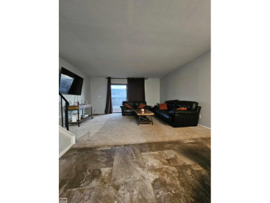 This charming 2-bedroom, 2.5-bath townhouse-style condominium on Marysville Golf Course in Michigan - for sale on GolfHomes.com, golf home, golf lot
