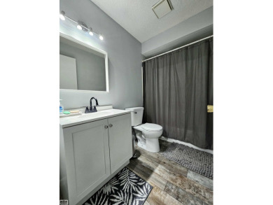 This charming 2-bedroom, 2.5-bath townhouse-style condominium on Marysville Golf Course in Michigan - for sale on GolfHomes.com, golf home, golf lot