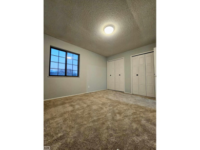 This charming 2-bedroom, 2.5-bath townhouse-style condominium on Marysville Golf Course in Michigan - for sale on GolfHomes.com, golf home, golf lot