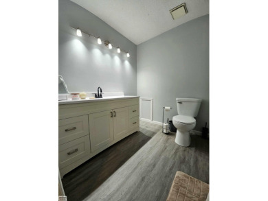 This charming 2-bedroom, 2.5-bath townhouse-style condominium on Marysville Golf Course in Michigan - for sale on GolfHomes.com, golf home, golf lot