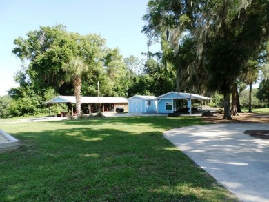 This unique opportunity allows for the purchase of a property on Rainbow Springs Golf and Country Club in Florida - for sale on GolfHomes.com, golf home, golf lot