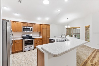 Move-in ready! Introducing this spacious handicap accessible 3/2 on Egret Championship Golf Course in Florida - for sale on GolfHomes.com, golf home, golf lot