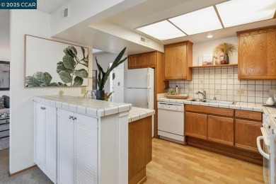 Open Sun 1-4pm. This Sonoma Wrap has 2 bedrooms, 2 bathrooms, in on Rossmoor Golf Course in California - for sale on GolfHomes.com, golf home, golf lot