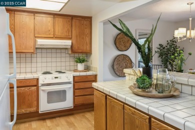 Open Sun 1-4pm. This Sonoma Wrap has 2 bedrooms, 2 bathrooms, in on Rossmoor Golf Course in California - for sale on GolfHomes.com, golf home, golf lot
