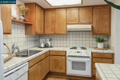 Open Sun 1-4pm. This Sonoma Wrap has 2 bedrooms, 2 bathrooms, in on Rossmoor Golf Course in California - for sale on GolfHomes.com, golf home, golf lot