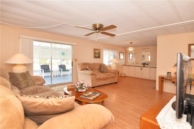 Immaculate, Impeccably maintained, welcoming home with on Barefoot Bay Golf Course in Florida - for sale on GolfHomes.com, golf home, golf lot