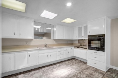 Welcome to this charming expanded 1-bedroom, 1-bathroom home on Leisure World Seal Beach Golf Course in California - for sale on GolfHomes.com, golf home, golf lot