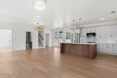 Welcome to 355 S Middleton Dr NW, a stunning new construction on Brunswick Plantation and Golf Resorts in North Carolina - for sale on GolfHomes.com, golf home, golf lot