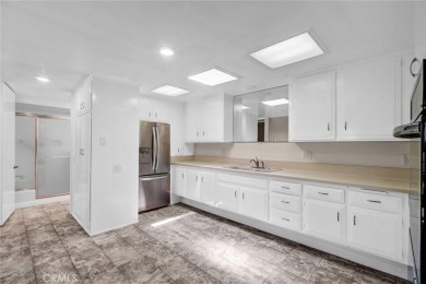 Welcome to this charming expanded 1-bedroom, 1-bathroom home on Leisure World Seal Beach Golf Course in California - for sale on GolfHomes.com, golf home, golf lot