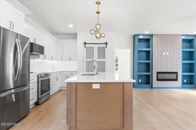 Welcome to 355 S Middleton Dr NW, a stunning new construction on Brunswick Plantation and Golf Resorts in North Carolina - for sale on GolfHomes.com, golf home, golf lot