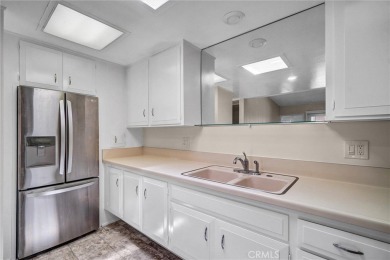 Welcome to this charming expanded 1-bedroom, 1-bathroom home on Leisure World Seal Beach Golf Course in California - for sale on GolfHomes.com, golf home, golf lot