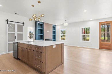 Welcome to 355 S Middleton Dr NW, a stunning new construction on Brunswick Plantation and Golf Resorts in North Carolina - for sale on GolfHomes.com, golf home, golf lot