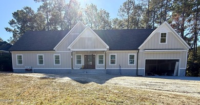 Your coastal dream home is within reach - brand-new construction on Brunswick Plantation and Golf Resorts in North Carolina - for sale on GolfHomes.com, golf home, golf lot