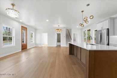 Welcome to 355 S Middleton Dr NW, a stunning new construction on Brunswick Plantation and Golf Resorts in North Carolina - for sale on GolfHomes.com, golf home, golf lot
