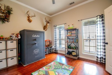 Welcome home to this charming 4-bedroom, 2-bathroom residence on Sugar Tree Golf and Country Club in Texas - for sale on GolfHomes.com, golf home, golf lot